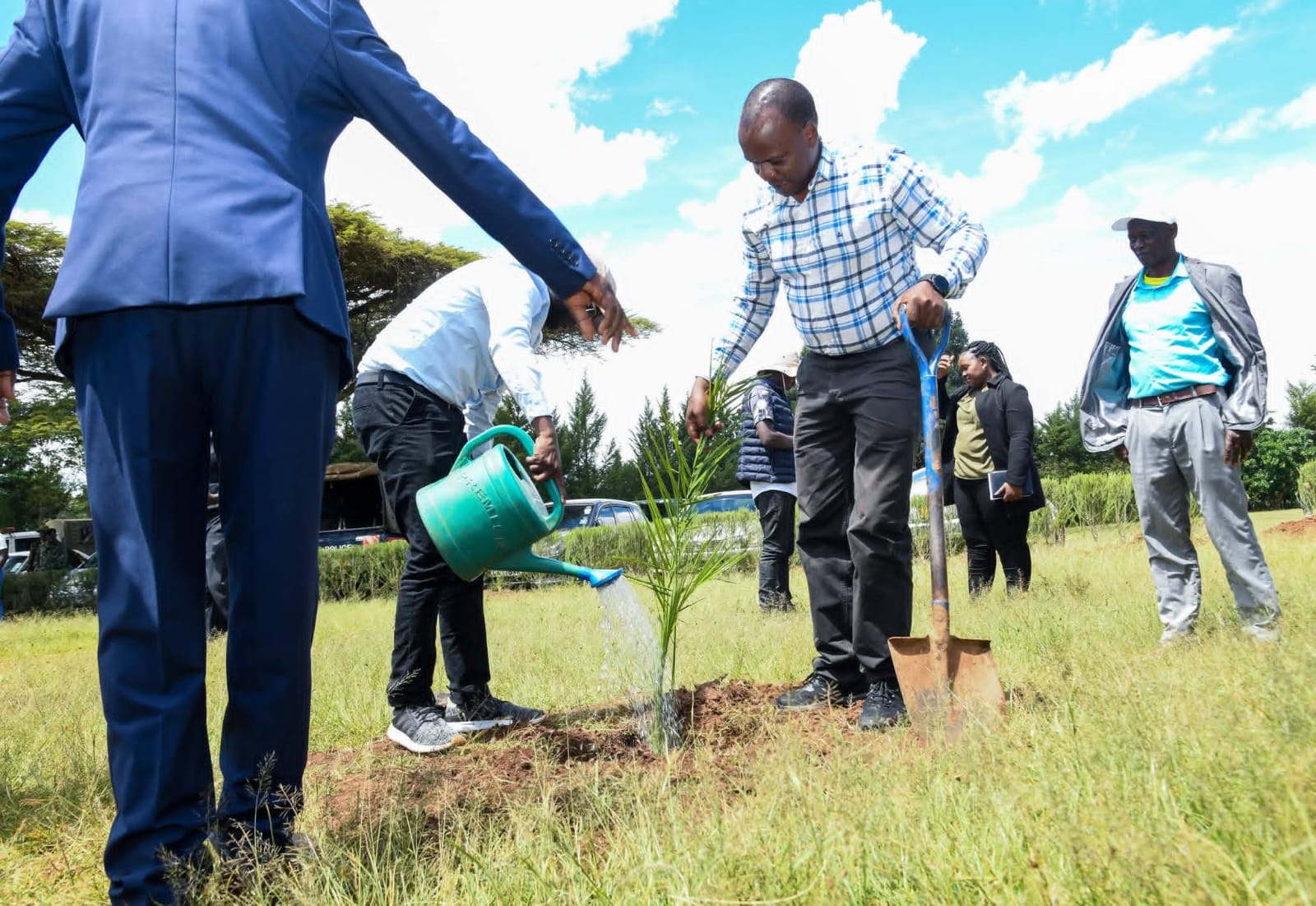 Secretary for Forest Development Mr. George Taurus leads a ceremonial tree planting during the Turbo Forest Public Participation Forum, marking the conclusion of the multi-agency inspection exercise. 