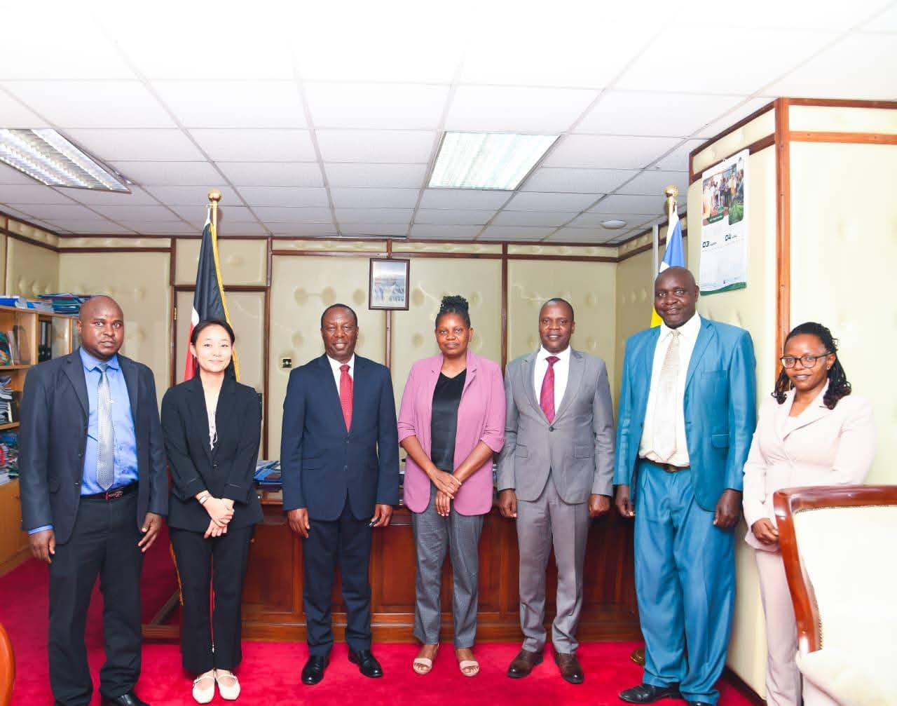 Senior official of State Department For Forestry led by PS Mr. Gitonga G. Mugambi with IOM Programme Coordinator Yujin Park at Ministry headquarters .