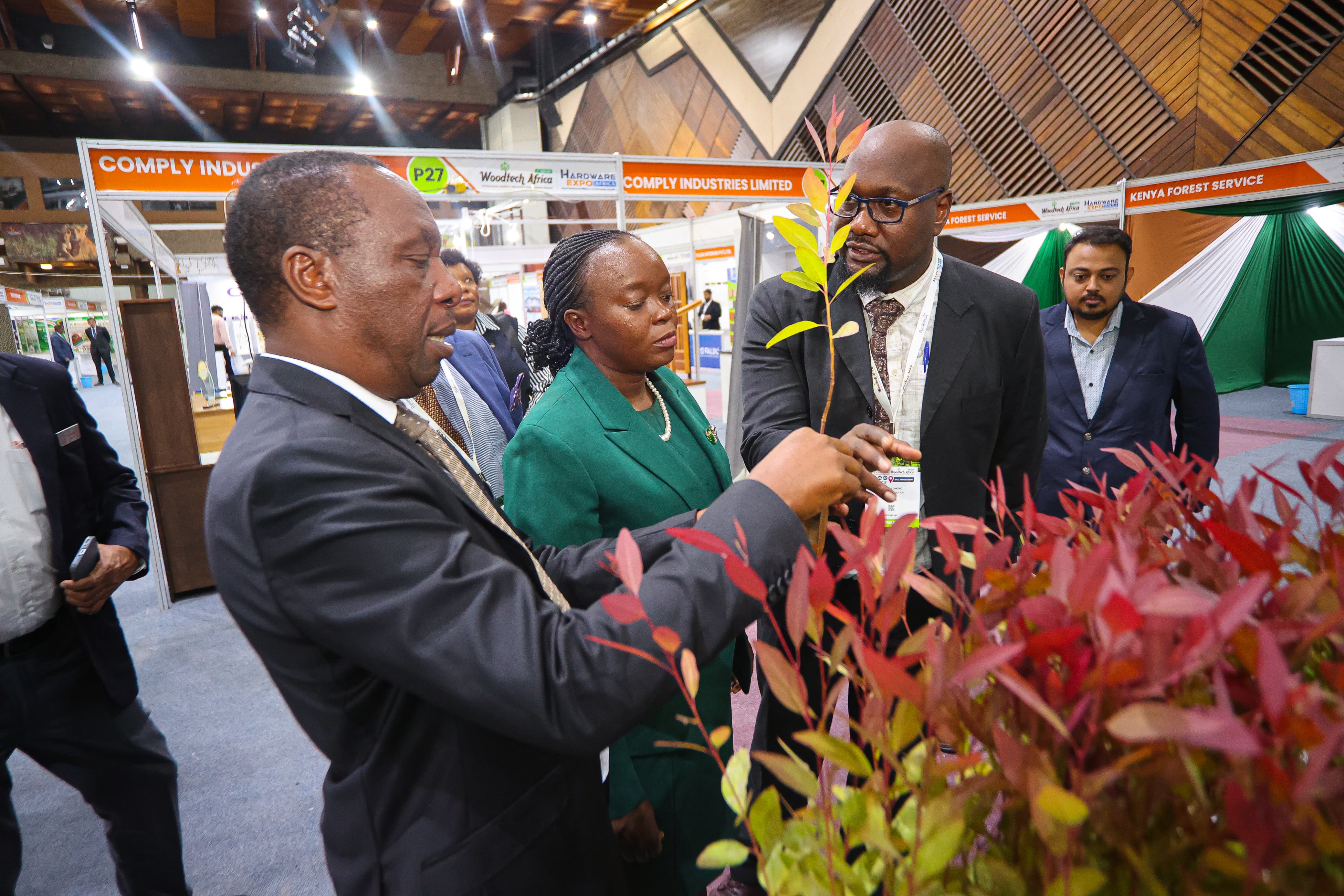 Cabinet Secretary for the Ministry of Environment, Climate Change and Forestry, Dr. Deborah Mlongo Barasa, accompanied by PS Mr. Gitonga Mugambi and other dignitaries, tours the exhibition floor during the 3rd Woodtech Africa International Exhibition and Conference at KICC, Nairobi, on 26 November 2025.