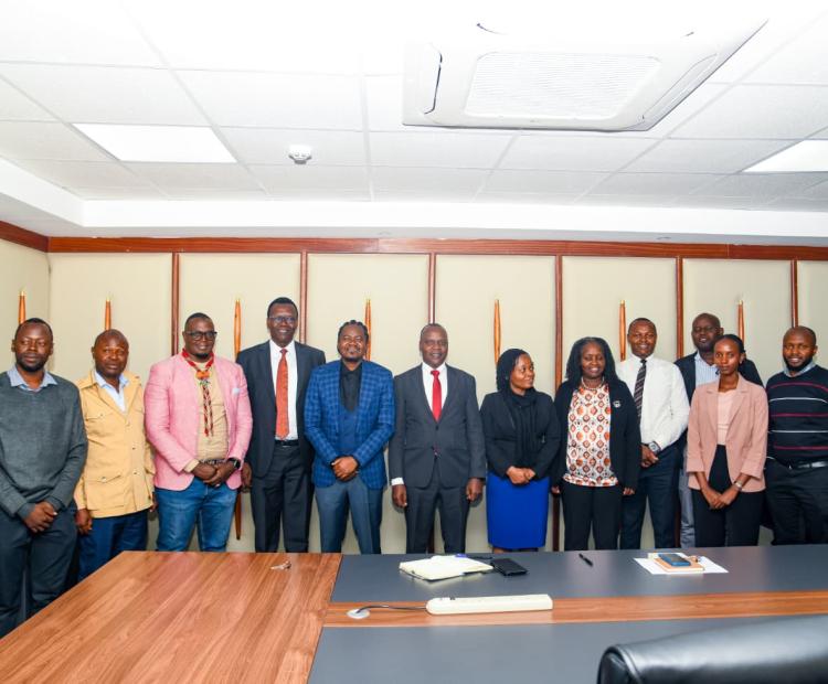 Forest Developement Secretary Mr. George Taurus and renowned Kenyan rapper and pioneer of the Genge music genre, Mr. Paul Julius Nunda (Jua Cali) and other officials during consultative meeting on the youth involvement in strengthening the 15Billion programme