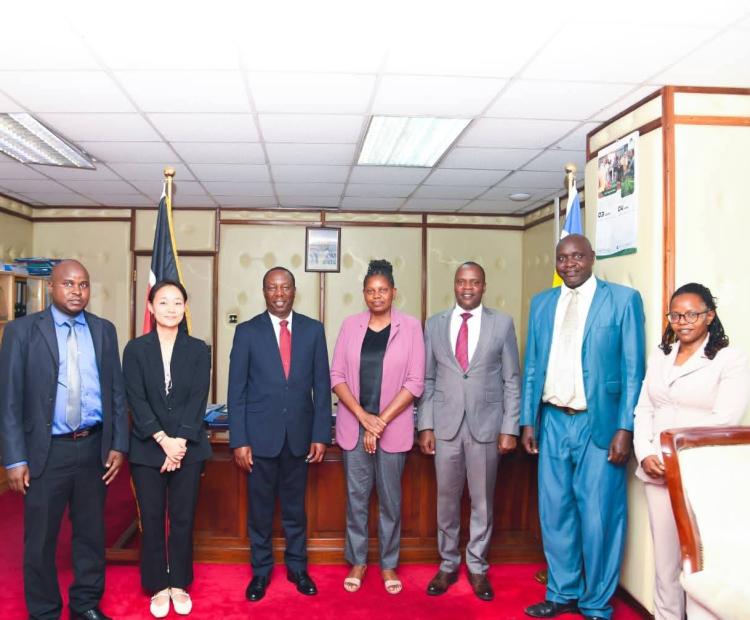  Senior official of State Department For Forestry led by PS Mr. Gitonga G. Mugambi with IOM Programme Coordinator Yujin Park at Ministry headquarters .