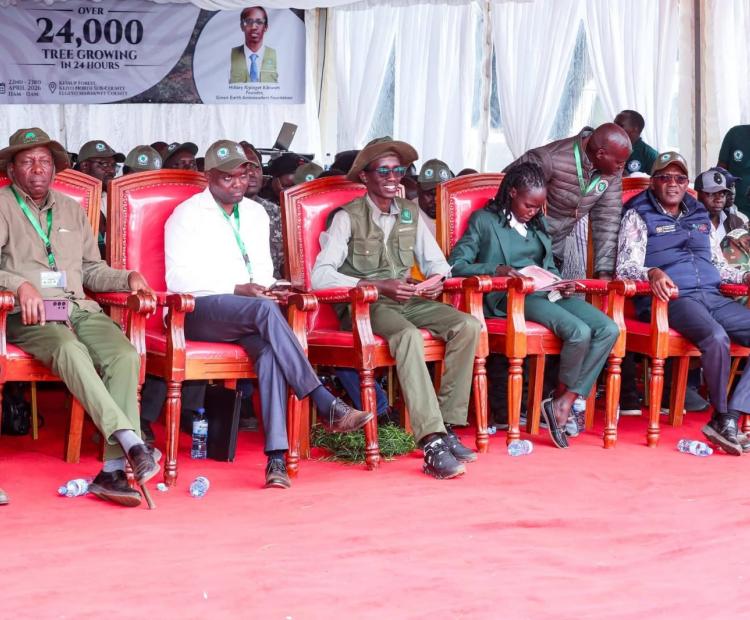 Enviromentalist Hillary Kibiwot alongside Government officials during the 7th edition of the Kaptagat annual tree planting at Kessup Forest.